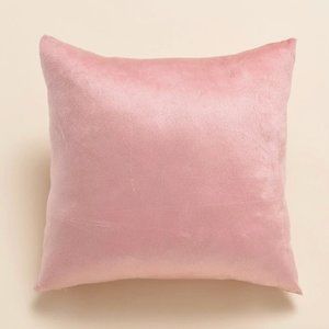 Pink velvet decorative cushion covers.